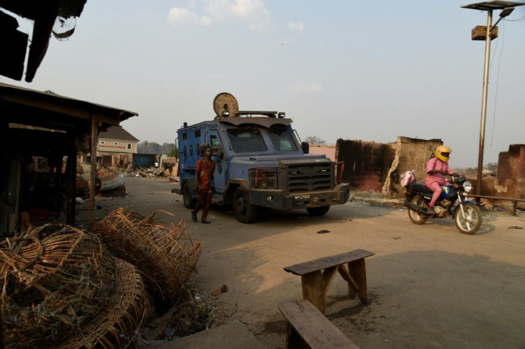 A police armoured personnel carrier stood guard at the Shasha market