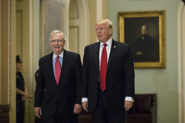 Better days: then-president Donald Trump (R) and Mitch McConnell, the powerful Senate majority leader at the time, in October 2017.