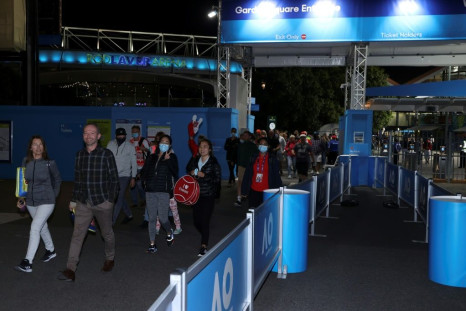 Spectators leave the venue of the Australian Open in Melbourne ahead of the five-day lockdown on February 12. They are expected to be allowed to return from Thursday