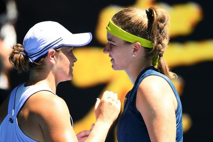 Karolina Muchova (right) is congratulated by top seed Ashleigh Barty after the Czech 25th seed's 1-6, 6-3. 6-2 victory in the Australian Open quarter-final