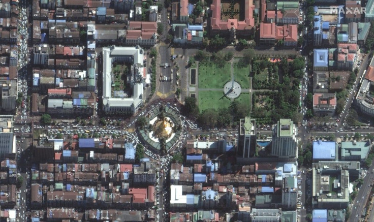 This handout satellite image released by Maxar Technologies shows protests and security forces near Yangon city hall on Tuesday