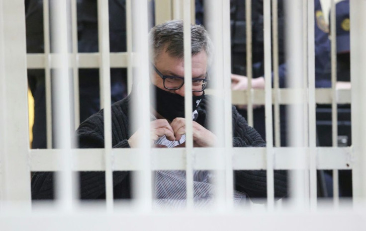 Babaryko appeared in court behind white bars in a cage for defendants and was photographed joining his hands to form the heart symbol popular at protests last year