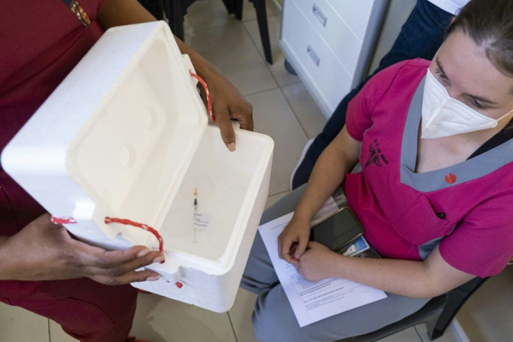 A health worker waits to administer the Johnson and Johnson vaccine at the Chris Hani Baragwanath Hospital in Soweto, South Africa