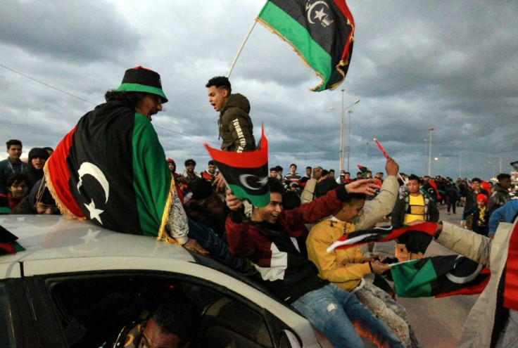 Libyans mark the anniversary of the revolution in the eastern city of Benghazi on Wednesday