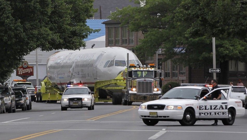 US Airways flight 1549 also known as the quotMiracle on the Hudsonquot is hauled on a truck through the streets in Elizabeth, New Jersey