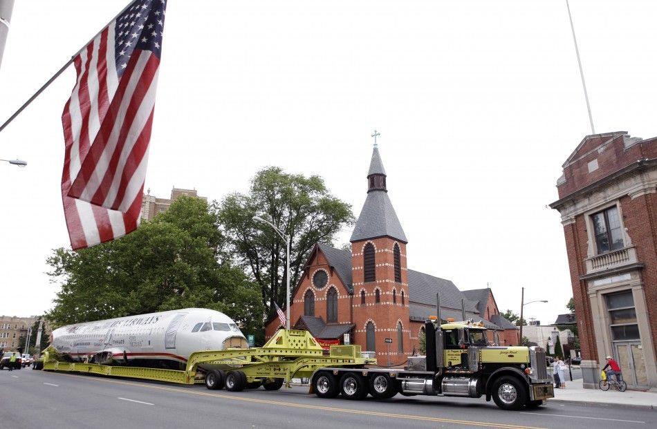 U.S. Airways flight 1549 also known as the quotMiracle on the Hudsonquot is hauled on a truck through the streets in Elizabeth, New Jersey
