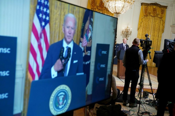 Speaking from the White House via video link US President Joe Biden warned of threats from China and Russia