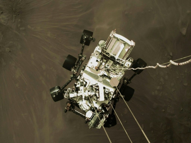 The high-resolution still was extracted from a video taken by the descent stage, which at that moment had used its six-engined jetpack to slow to a speed of about 1.7 miles (2.7 kilometers) per hour as part of the "skycrane maneuver"