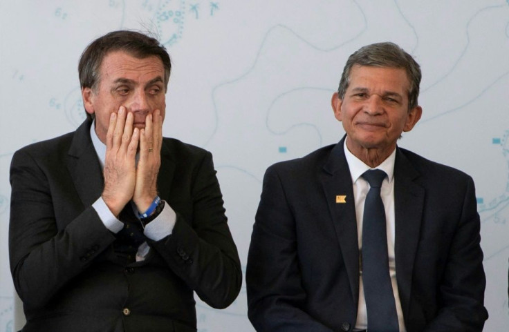 In this file photo taken on December 14, 2018, then-President-elect Jair Bolsonaro (L) and General Joaquim Silva e Luna attend a ceremony at a navy base in Itaguai city, Rio de Janeiro state