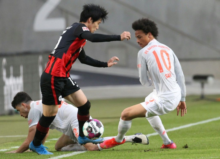 Frankfurt's Japan midfielder Daichi Kamada (L) scored the opening goal against Bayern Munich on Saturday