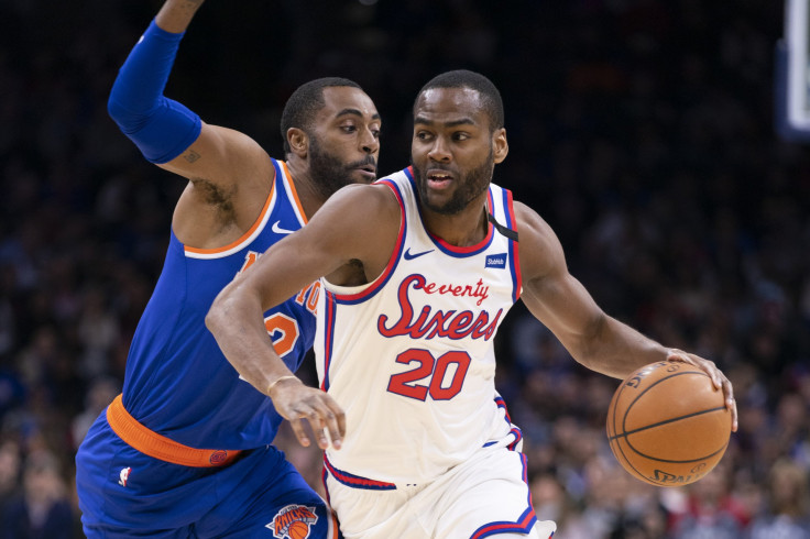 Alec Burks #20 of the Philadelphia 76ers dribbles the ball against Wayne Ellington #2 of the New York Knicks