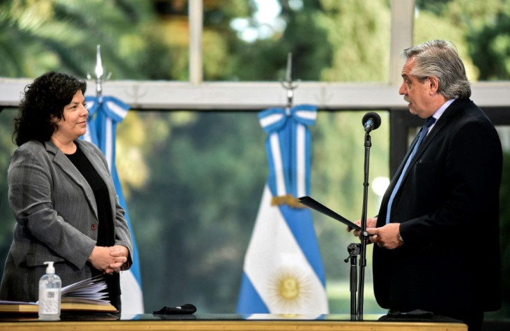 Argentina President Alberto Fernandez (right) swears in Carla Vizzotti as the new health minister a day after the vaccines scandal broke