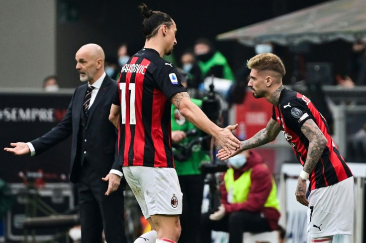 AC Milan forward Zlatan Ibrahimovic (C) went off with calf cramps in the San Siro.