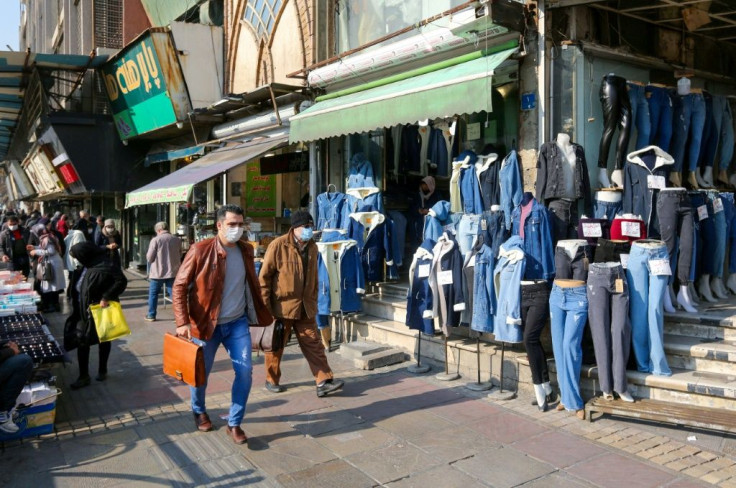 Iranians wearing protective masks in December 2020 amid the Covid-19 pandemic, which the family of Iranian-American Baquer Namazi is particularly worried about as it seeks his release