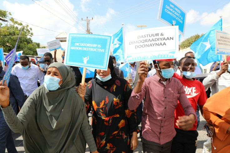 Supporters of different opposition presidential candidates demonstrate in Mogadishu on February 19, 2021