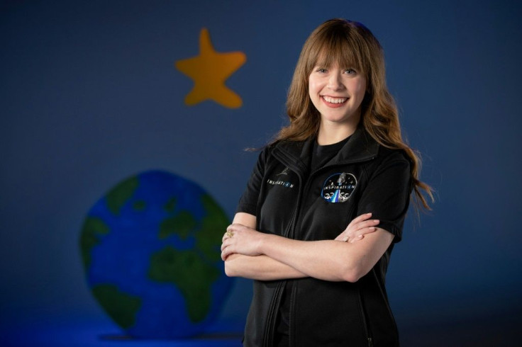 This undated photo courtesy of ALSAC received by AFP on February 22, 2021, shows St. Jude Children's Research Hospital's physician assistant and cancer survivor Hayley Arceneaux, posing for a photo when visiting a SpaceX facility in Hawthorne, California
