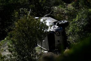 The vehicle driven by Tiger Woods lies on its side in Rancho Palos Verdes, California, on February 23, 2021, after his rollover accident