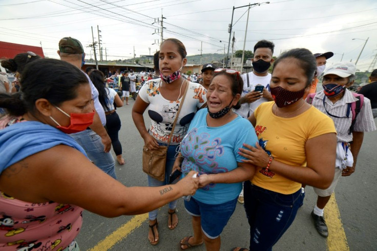 Relatives of prisoners caught up in Tuesday's violence gathered for news on the fate of their loved ones