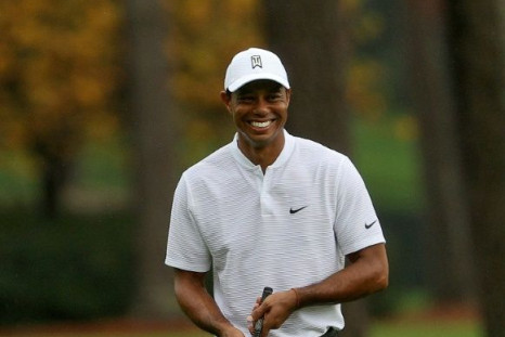 Tiger Woods turned professional in 1996 and won his first major title at the 1997 Masters with a course record