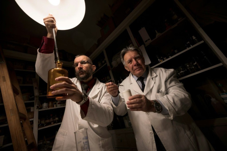 Nenad Jovanov (right) and his son Nemanja in their perfume shop in Belgrade