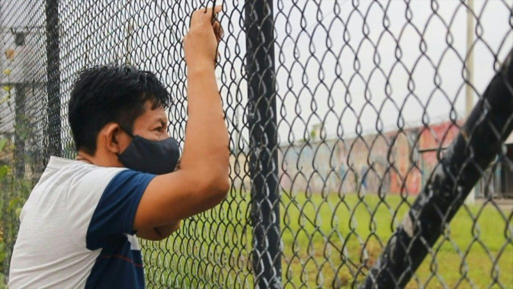 Families wait for news after scores die in Ecuador prison riots