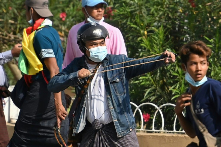 Some people brought slingshots to the rally in Yangon