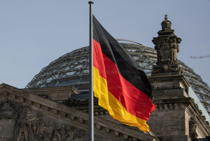 The German flag flys outside the Reichstag, the building which houses the Bundestag, the German lower house of parliament, in Berlin.