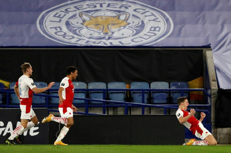 Lukas Provod (R) celebrates after scoring the opening goal for Slavia Prague away to Leicester City