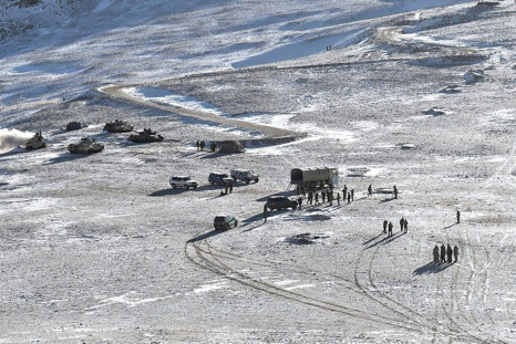 Chinese soldiers undertake a military disengagement along the Line of Actual Control at the India-China border in Ladakh