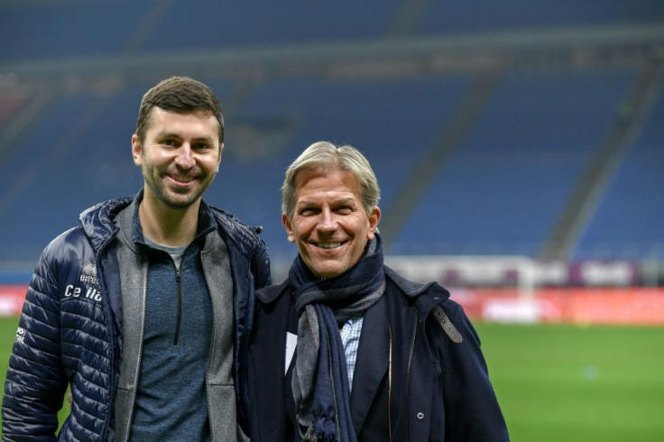 Parma's US owner Kyle J. Krause (R) and his son Tanner before a Serie A match against AC Milan in December 2020.