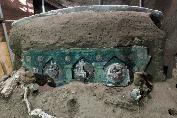 The four-wheel processional chariot was missed by looters who tunneled by on either side