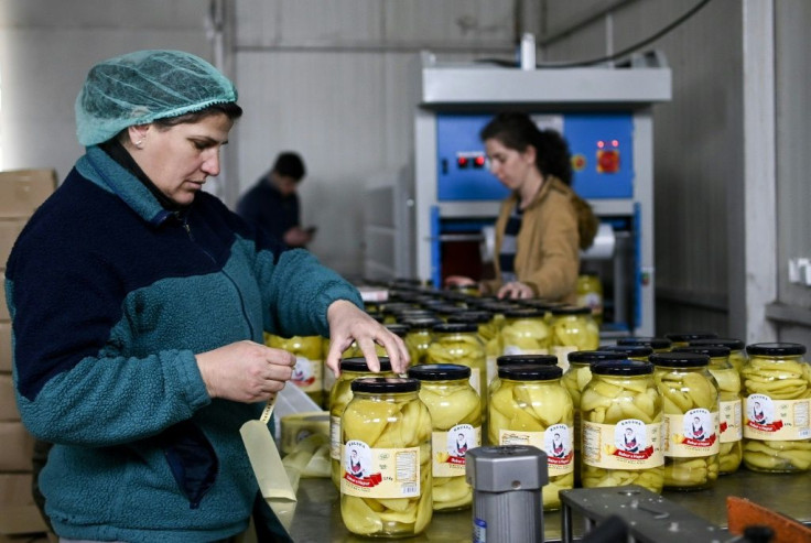 Pickling and processing vegetables at the Koperativa Krusha helps keep dozens of Kosovar widows employed