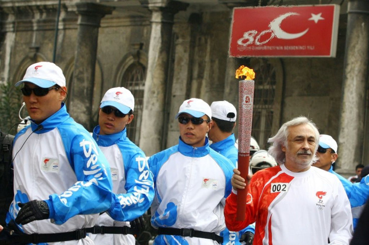Gezen runs with the Olympic Torch in Istanbul on April 3, 2008