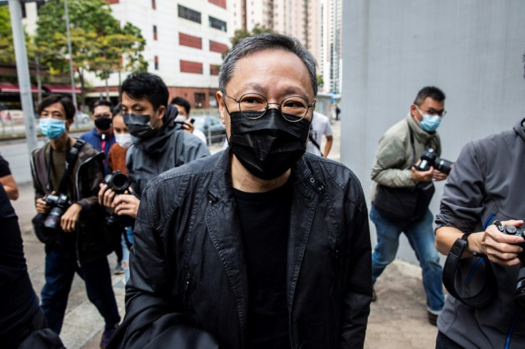 Pro-democracy activist Benny Tai arrives at a police station in Hong Kong to face a subversion charge
