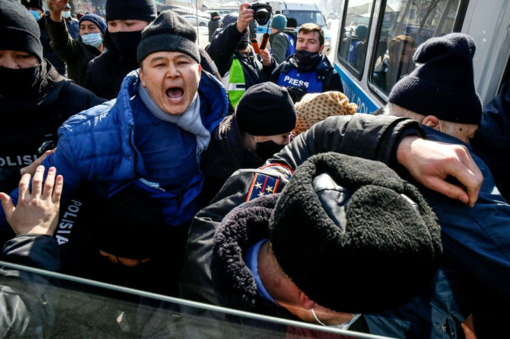 Several of the protesters shouted 'freedom to political prisoners' as they were manhandled into waiting vans