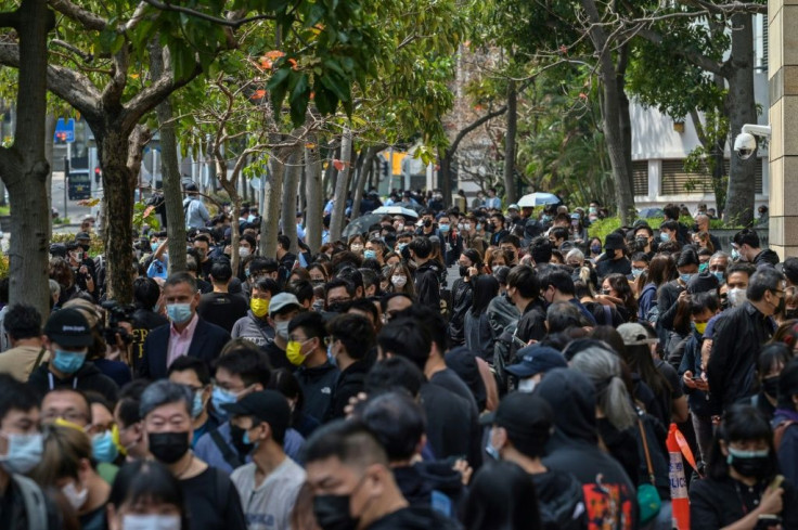 Hundreds queued to attend the hearing for those charged with subversion