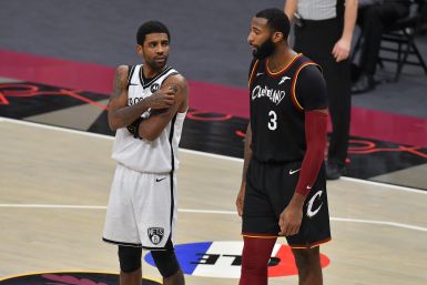 Kyrie Irving #11 of the Brooklyn Nets talks with Andre Drummond #3 of the Cleveland Cavaliers