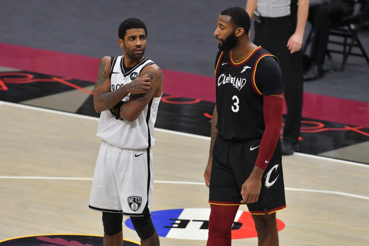 Kyrie Irving #11 of the Brooklyn Nets talks with Andre Drummond #3 of the Cleveland Cavaliers