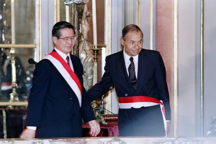 Alberto Fujimori (L), then president of Peru, greeting new prime minister Oscar de la Puente Raygada, on April 6, 1992 in Lima.