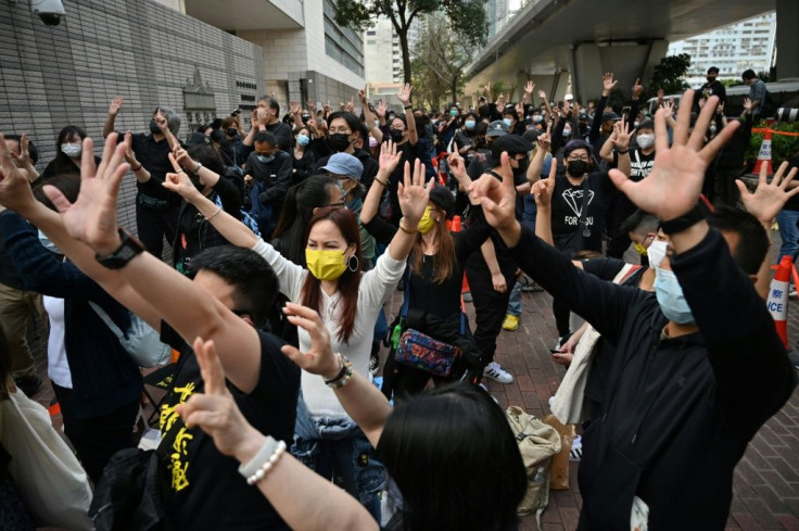 Hundreds of protesters gathered outside the court house on Monday as the mammoth bail hearings got under way