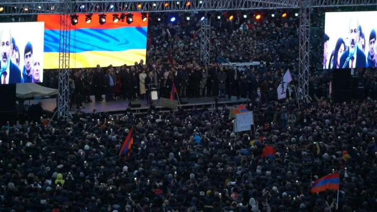 IMAGES Supporters of Armenian Prime Minister Nikol Pashinyan hold a rally on Republic Square in the centre of Yerevan amid a deepening political crisis over last year's war with Azerbaijan. Pashinyan is under increasing pressure from the opposition for hi