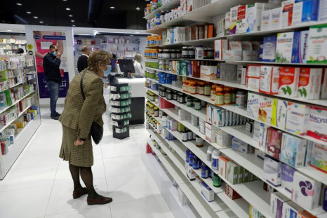 Customers browse the aisles for medicine at a pharmacy in the Lebanese capital Beirut in this file picture taken on February 2, 2021