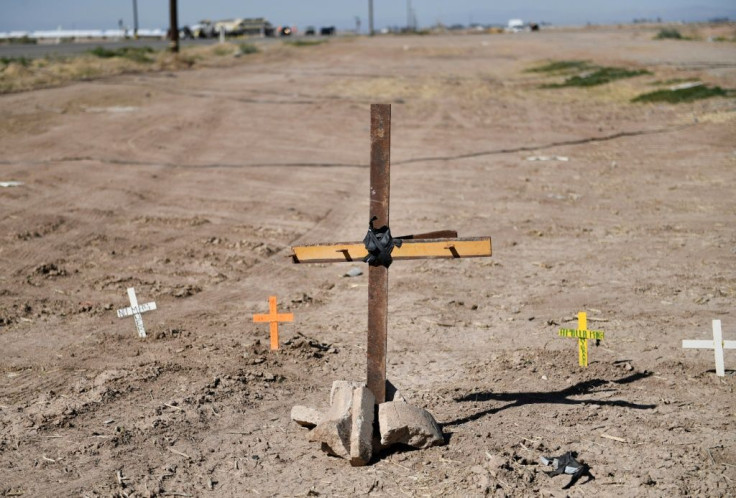 Crosses are seen near the scene of the crash on State Route 115 near the town of Holtville, California not far from Mexico