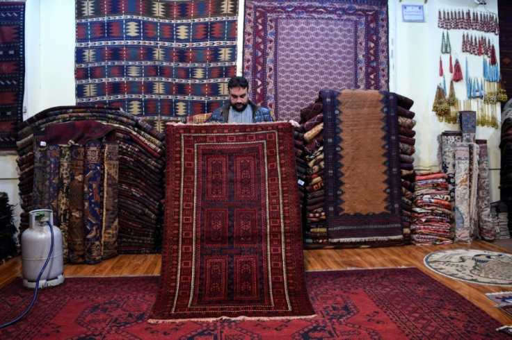 Afghanistan's rug hunters can spend weeks or months passing through villages like sleuths along old caravan trails