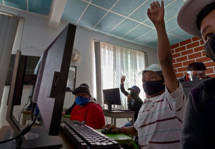 After the pandemic closed their school, these students living in a poor neighborhood near the Mexican capital have been taught how to use computers for the first time