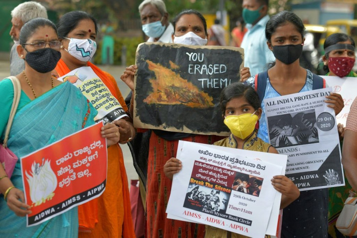 Activists with various women's rights groups protest in October against atrocities committed on women in India