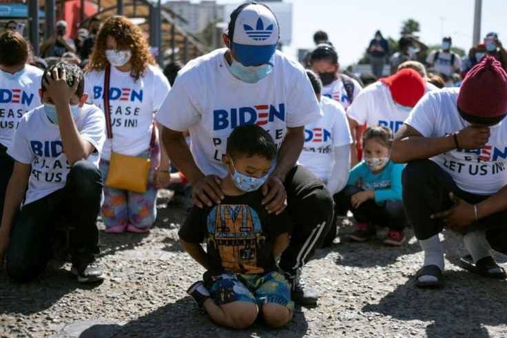 Migrants trying to get into the United States protested at the border with Mexico, begging to be allowed to start the asylum process