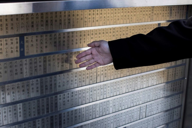 Ganbe shows the name of his friend who was killed during Japan's 2011 tsunami