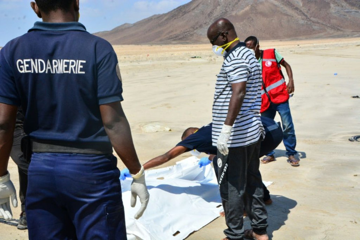 Djibouti has become a hub for migrants seeking to cross to Yemen and then seek work in the rich Gulf economies. Above: Police recover a body after two boats carrying migrants capsized in January 2019