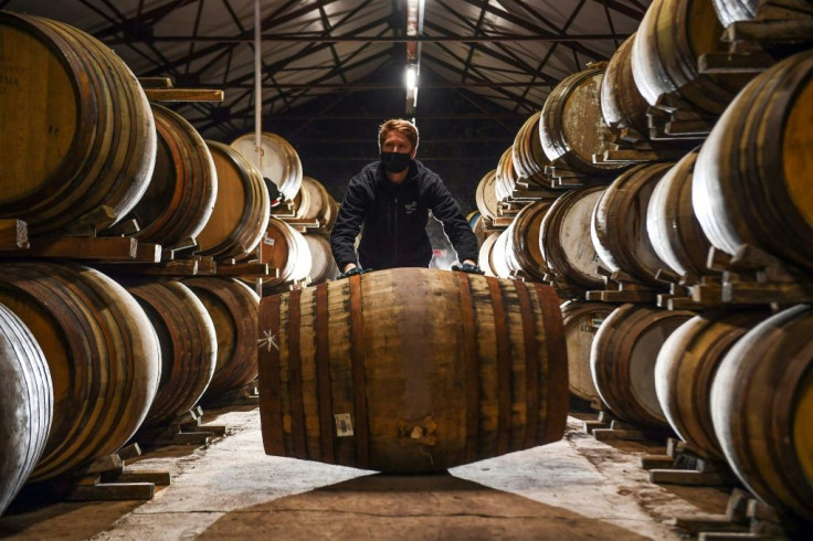 The four-month tariffs suspension will freeze a 25 percent surcharge on Scotch whisky as well as hefty duties on cashmere, machinery and other US-bound British exports.